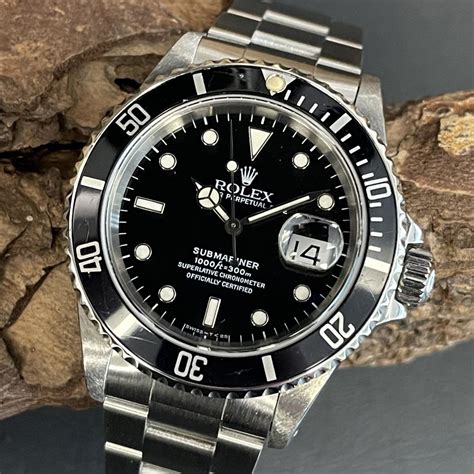 rolex submariner date 16610 price.